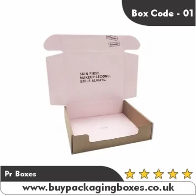 Pink PR box with inside branding that reads “Skin First. Makeup Second. Smile Always