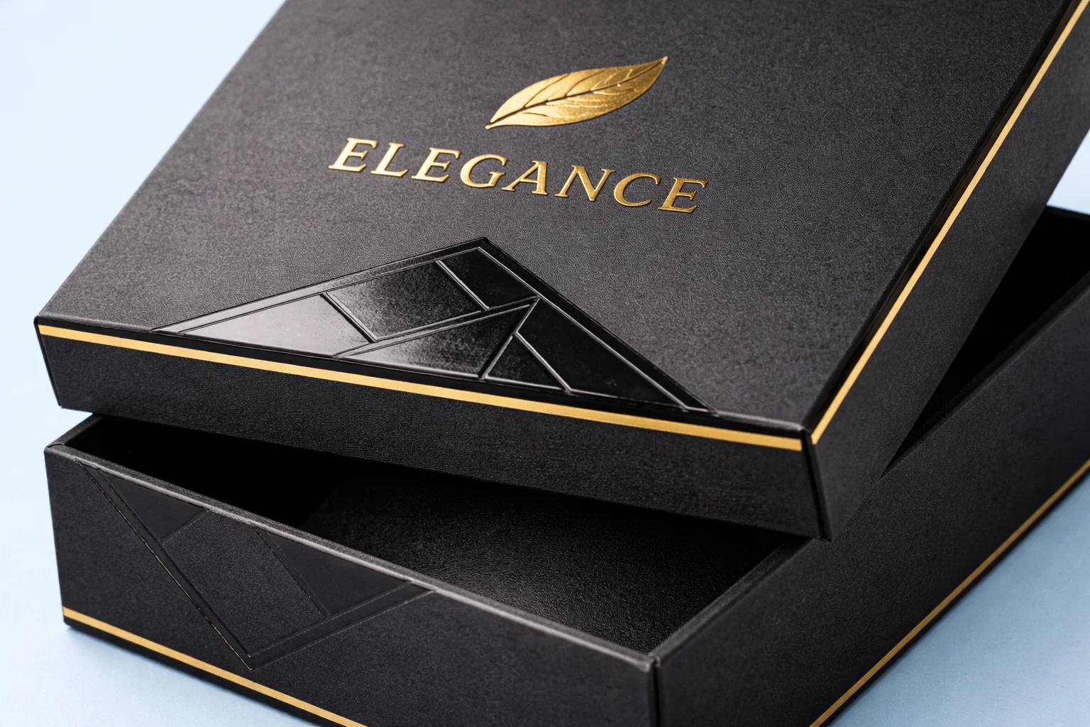 Luxury rigid box with gold foil detailing and magnetic lid